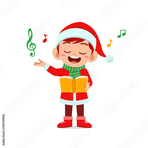 happy cute little kid boy and girl wearing red christmas costume and sing a song