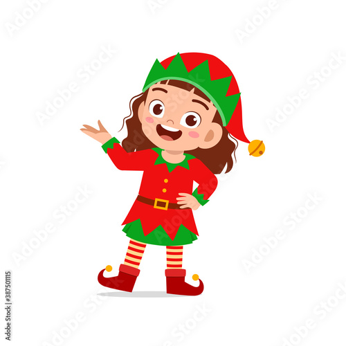 happy cute little kid boy and girl wearing green elf christmas costume