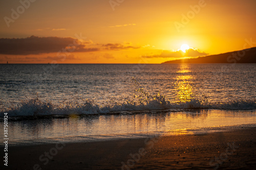 Sunset with Ocean waves, Maui, Hawaii