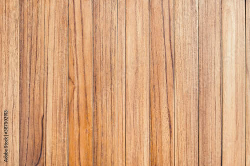 Above view of brown panel wooden texture background. Old striped wood lumber wall. Vintage board floor natural pattern. The surface of the table plank teak. Top view