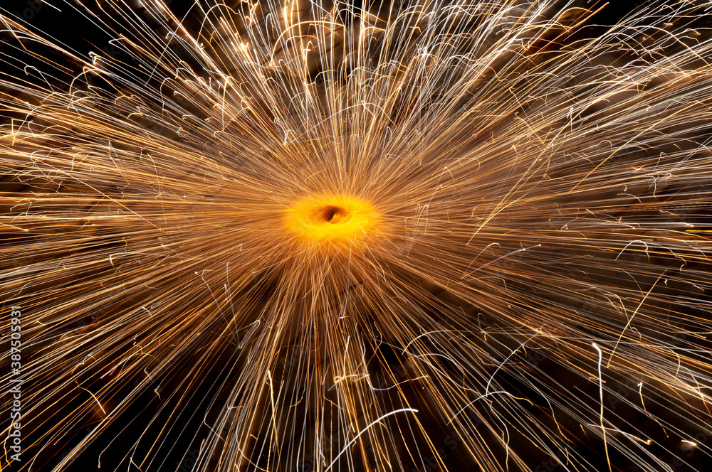 Naklejka premium Zameen chakri a popular firecracker lit during Diwali celebrations.