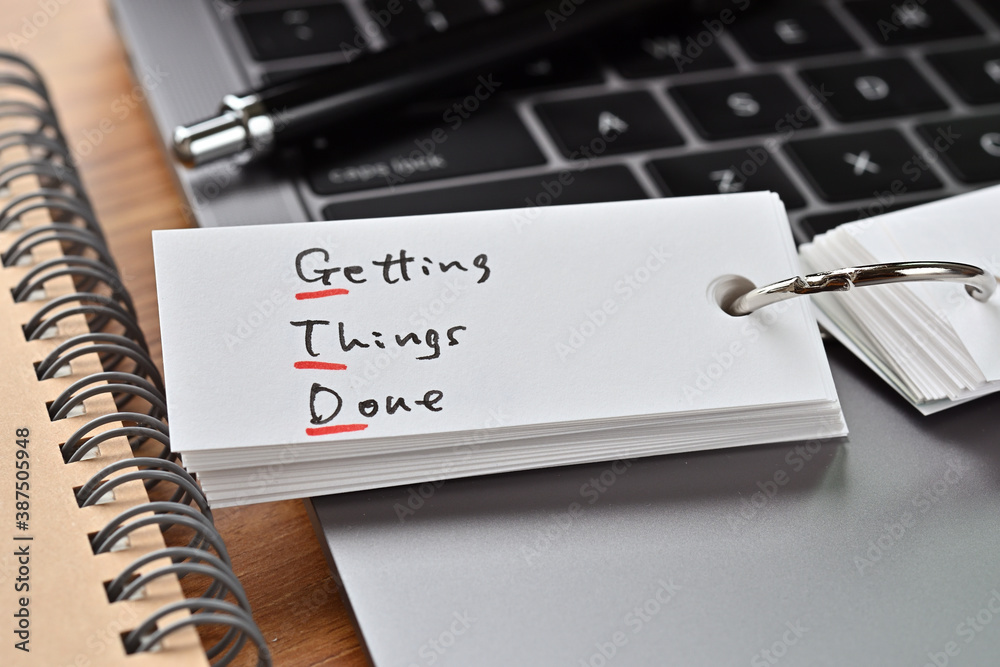 The words "GTD" written in a word book. Close-up. It is an acronym for "Getting  Things Done". Stock-Foto | Adobe Stock