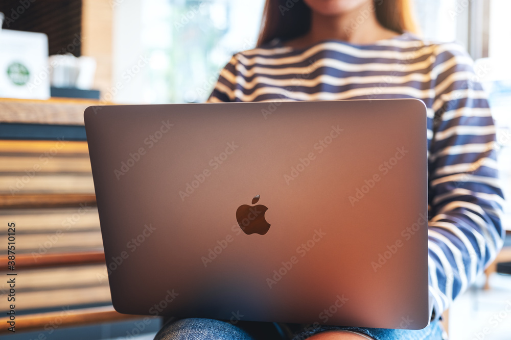 Oct 3rd 2020 : A woman using and working on Apple MacBook Pro laptop  computer , Chiang mai Thailand Photos | Adobe Stock