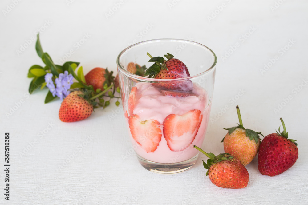 healthy foods yogurt from fruits strawberry for diet weight with purple flower decoration flat lay style on background white healthy foods yogurt from fruits strawberry for diet weight with purple flower decoration flat lay style on background white