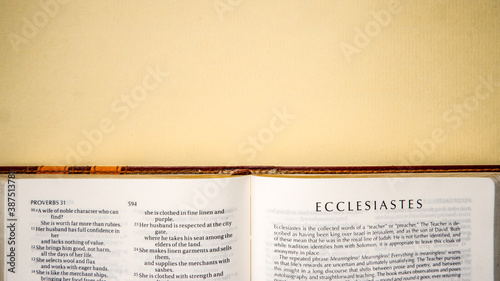 Open pages of the bible background (book of Ecclesiastes) photo