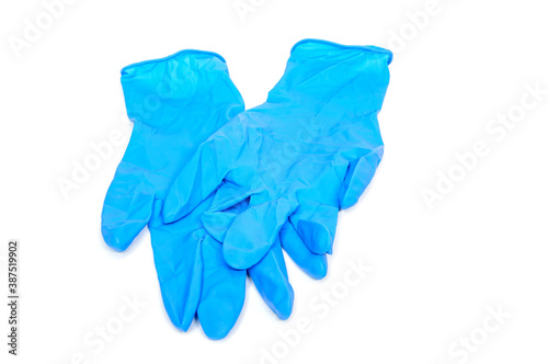 Blue gloves medical latex gloves white background © Lifefoto