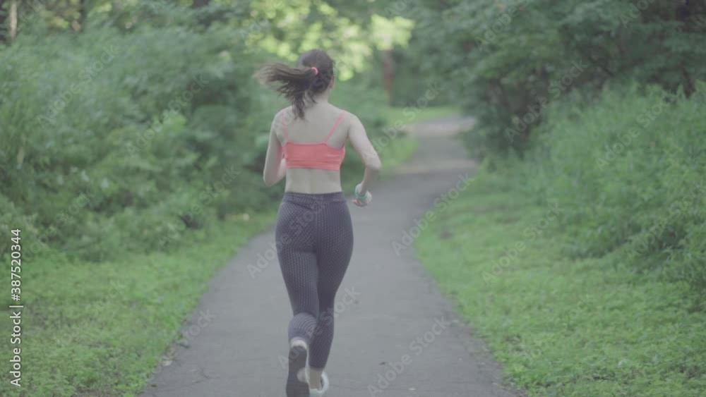 Girl running in the Park Girl running in the Park