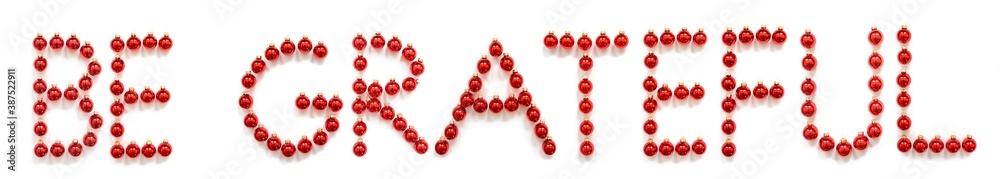 Red Christmas Ball Ornament Building English Word Be Grateful. Festive Christmas Decoration. White Isolated Background Red Christmas Ball Ornament Building English Word Be Grateful. Festive Christmas Decoration. White Isolated Background
