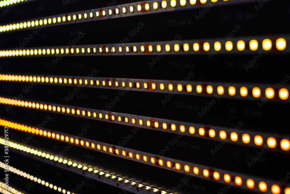 Defocused lights of LED strip, abstract background lights