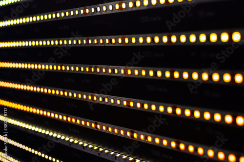 Defocused lights of LED strip, abstract background lights