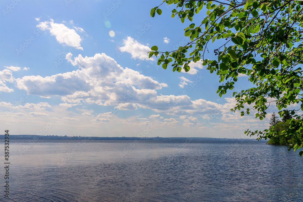 Summer daytime landscape of Lake Onega with blue sky and white clouds. Summer daytime landscape of Lake Onega with blue sky and white clouds.