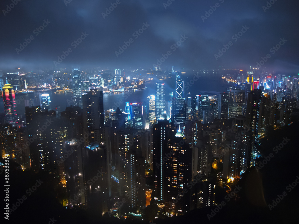Obraz premium landscape background, urban night buildings with views from above the mountains