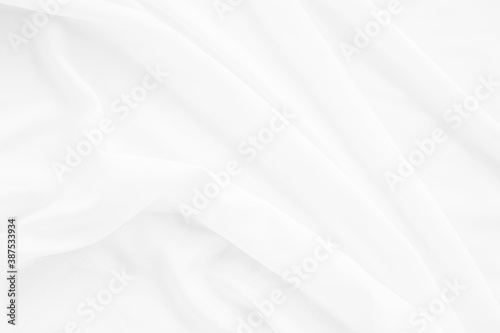 White fabric, cloth soft waves texture background./ Soft image.