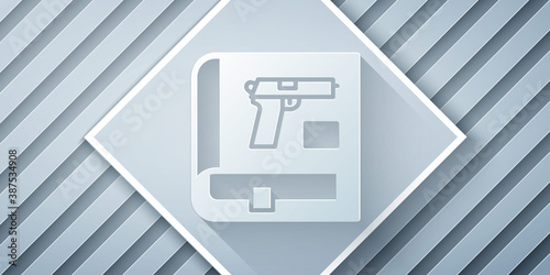 Paper cut Book with pistol or gun icon isolated on grey background. Police or military handgun. Small firearm. Weapon catalog. Paper art style. Vector.