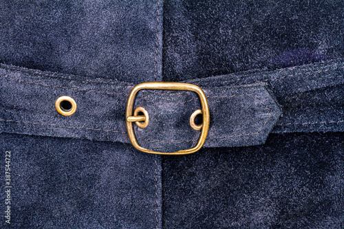 Genuine blue sude texture with a belt and buckle