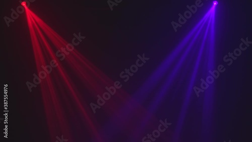 Stage with spot lighting, shining empty scene for holiday show, award Ceremony or advertising on the red and blue Background. Lighting equipment. Lighting effects. Dynamic light photo