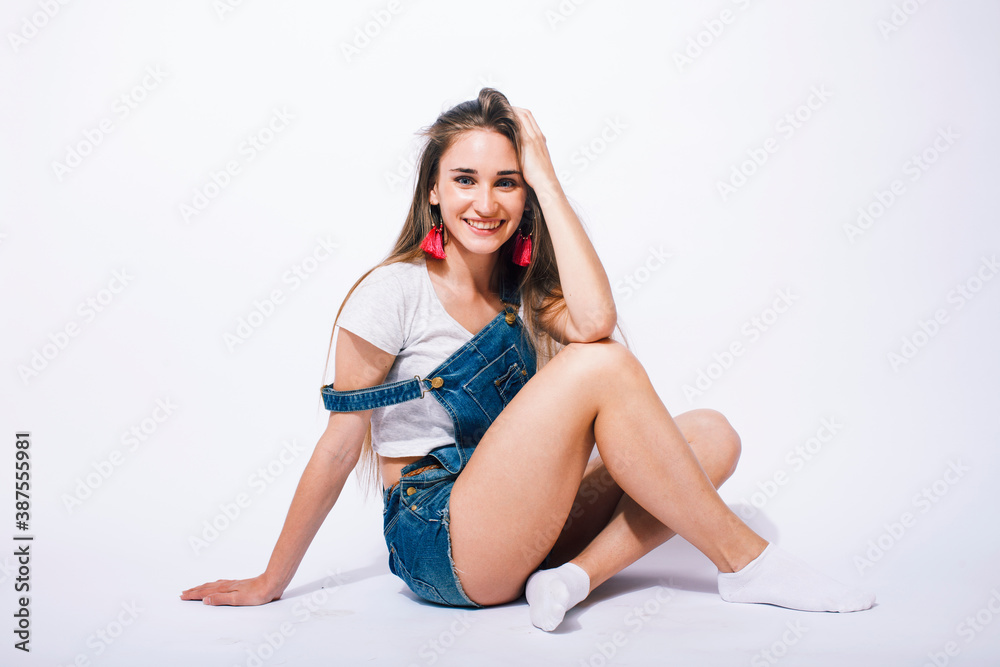 young pretty teenage girl posing cheerful on white background isolated, lifestyle people concept