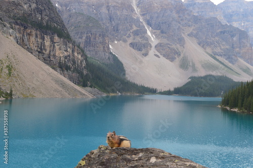 The turquoise Moraine Lake and the waterfalls and nature of the Rocky Mountains in British Columbia, Canada