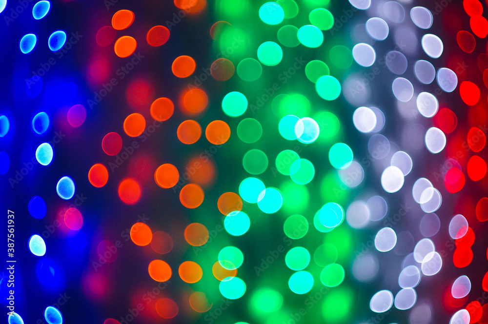 Naklejka premium Background of different color blurred light spots