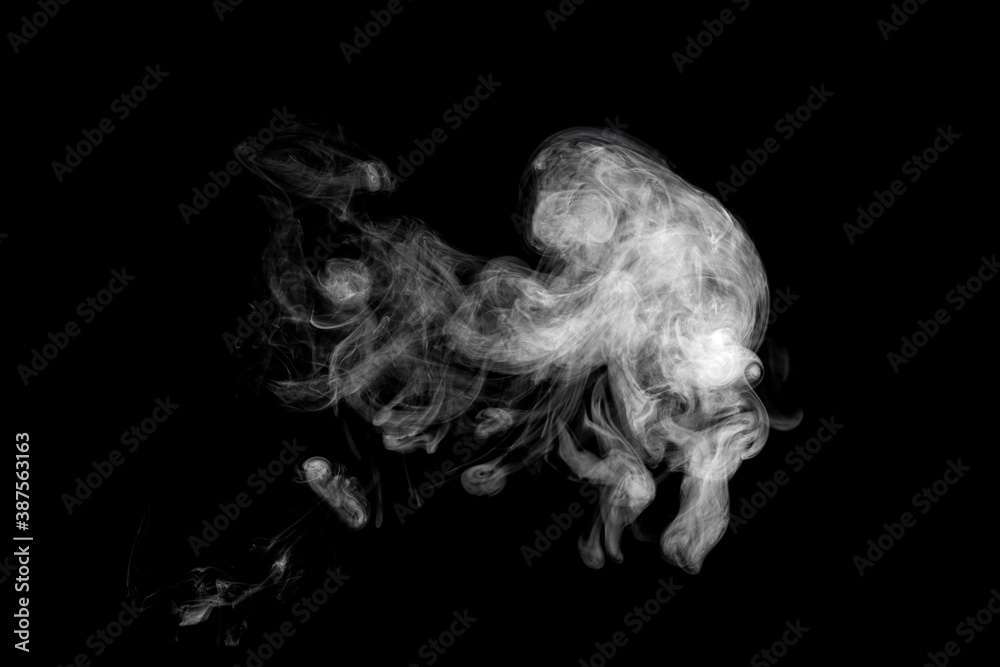 Movement of abstract beautiful cloud of white smoke isolated on black background. Movement of abstract beautiful cloud of white smoke isolated on black background.