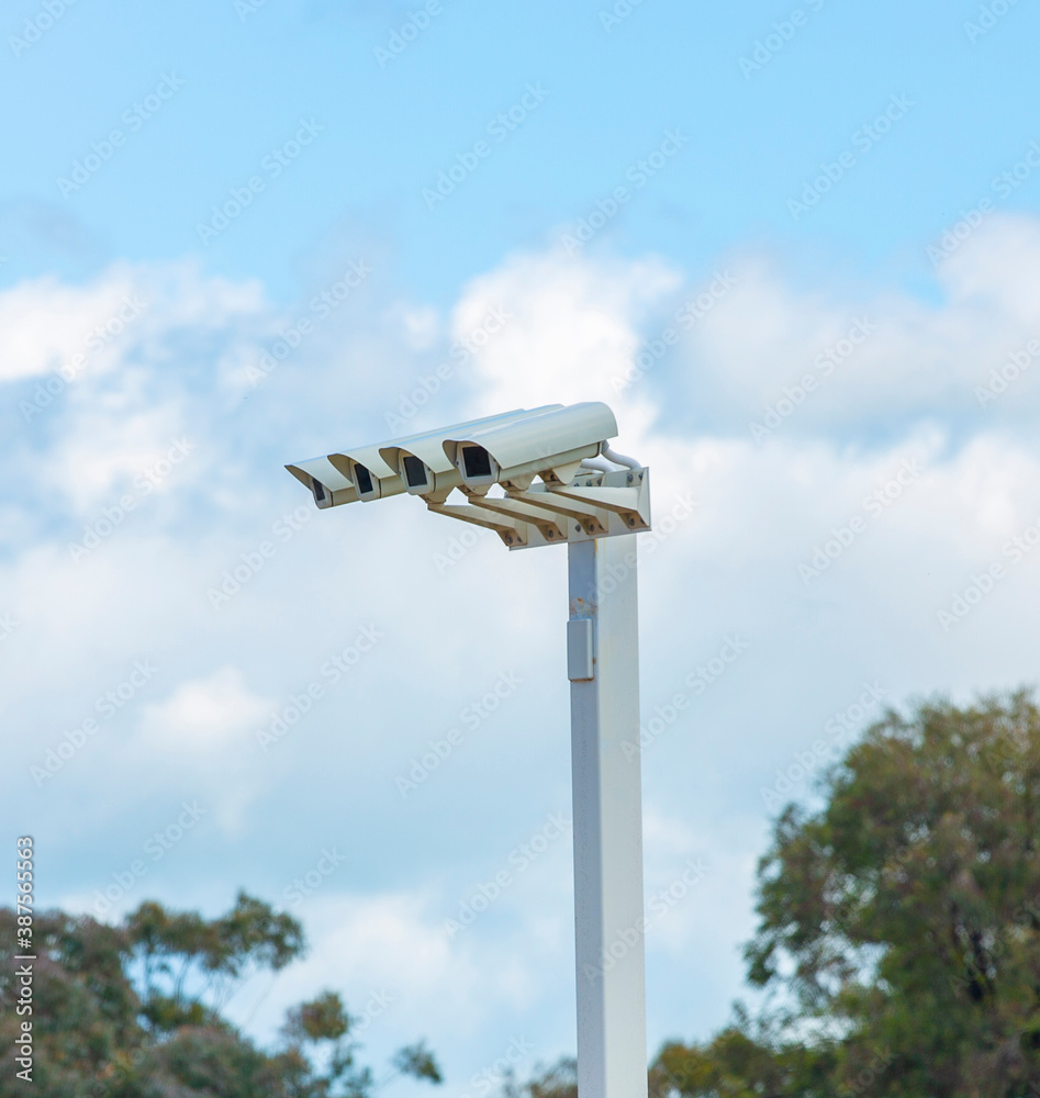 A modern CCTV camera performing surveillance and monitoring functions A modern CCTV camera performing surveillance and monitoring functions