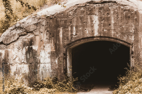 Entrance of an abandoned bunker. Post production Instagram Style.