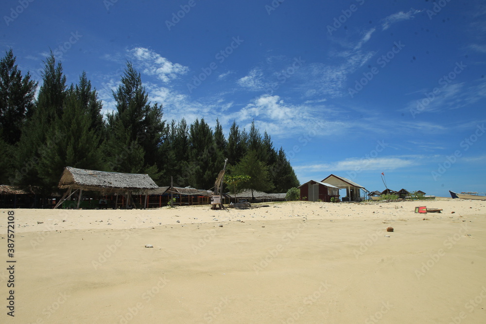 Lampuuk Beach, Aceh itself is ready to spoil your eyes with a panoramic view of the waves and its soft white sand.
