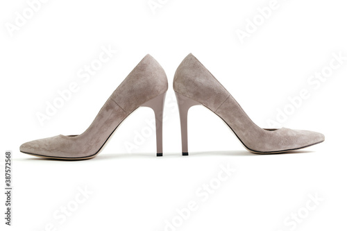 Stylish pink powder shoes on an isolated white background