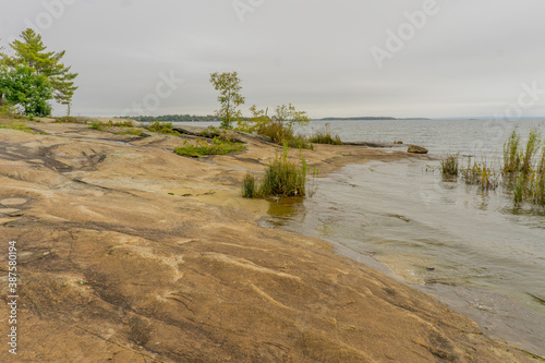 Typical Canadien Shield landscape. Georgian Bay Islands national park on a moody autumn day, Ontario, Canada photo