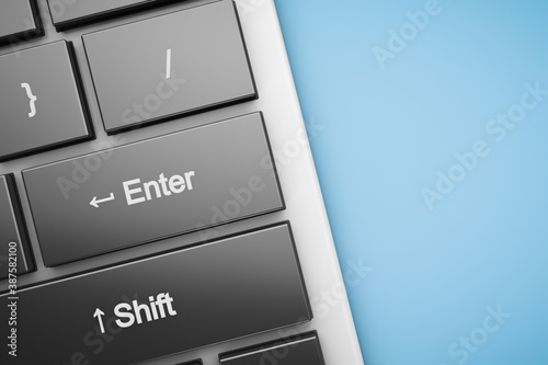 Close-up of the enter button on a computer keyboard. Copy space. photo