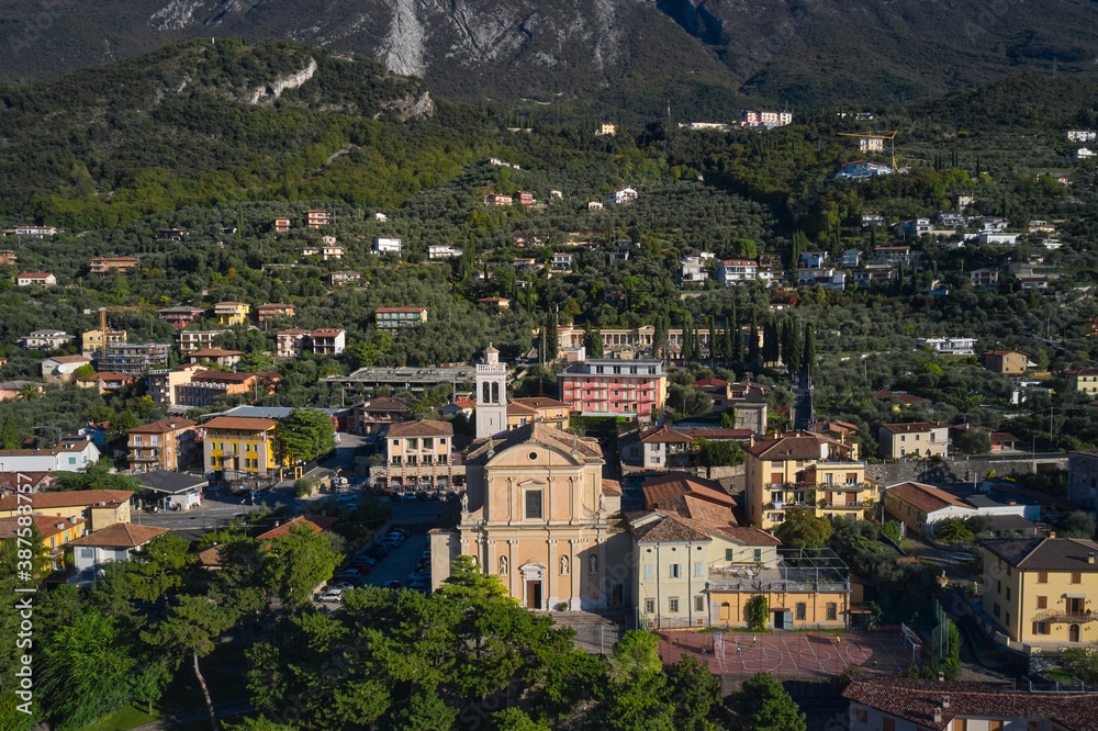 Malcesine town, Lake Garda, Italy. Aerial panoramic view of Parish of Santo Stefano, Malcesine town. Italian resort on Lake Garda, Monte Baldo.