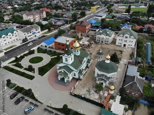 Christian temple in the center of the village from above