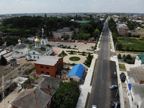Christian temple in the center of the village from above