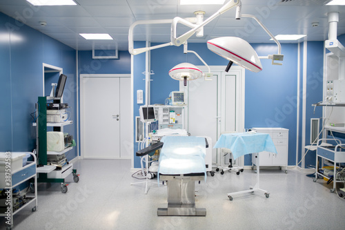 Operating room in contemporary clinics including operation table and others