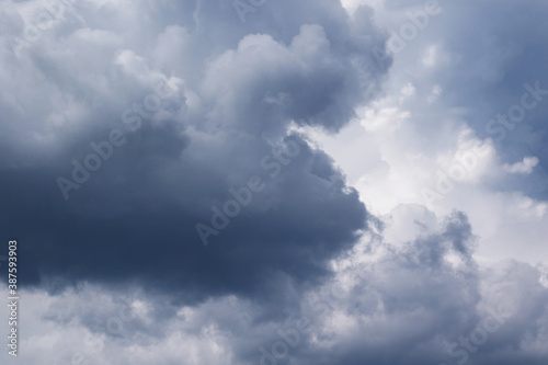 dramatic rainy cumulus clouds background