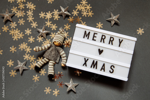 Christmas gray photophone with a sign with the inscription, snowflakes, stars and elf photo