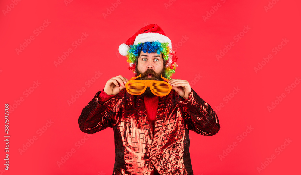 Happy New 2021 Year. Christmas party time. bearded santa claus in hat. celebrate the party. ready for xmas gifts and presents. mature man in glasses red background. new year shopping discounts
