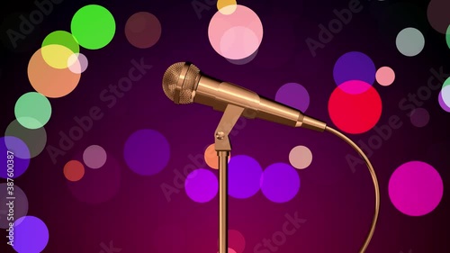 Golden microphone rotating on a stand. Colorful confetti falling background. Seamless looping