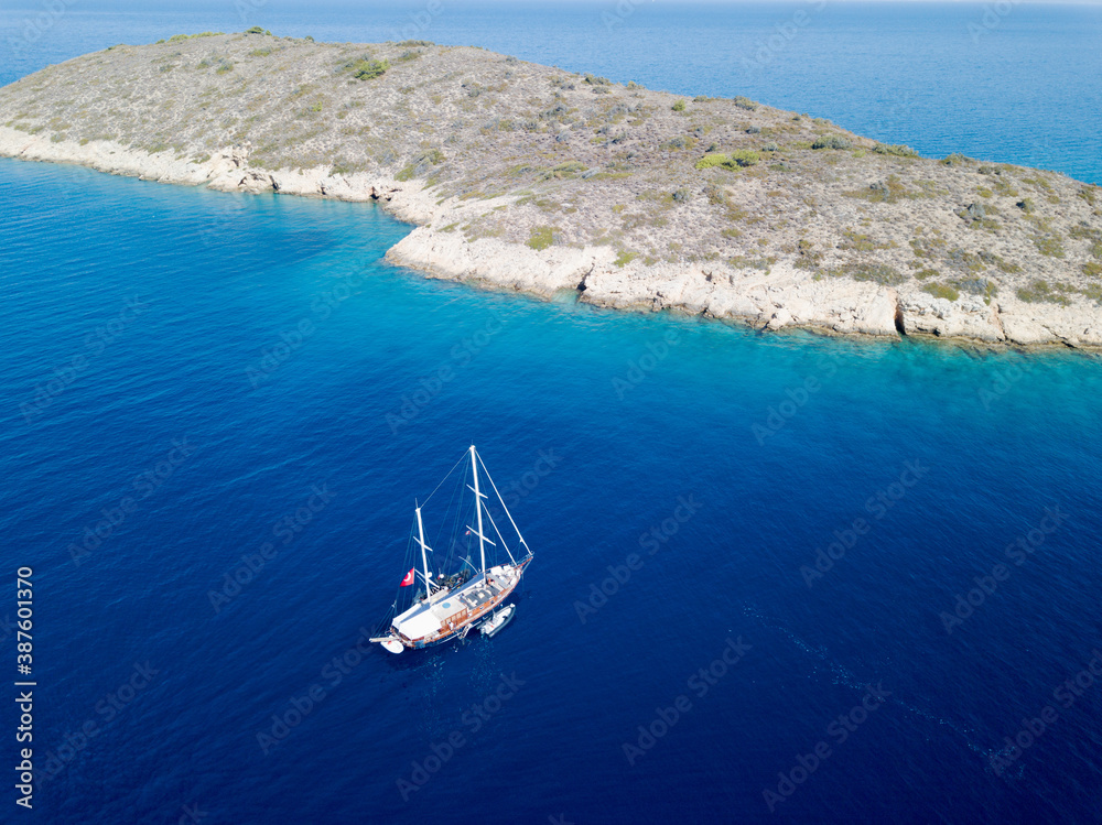 Aerial view of a sailing boat in Mersincik Island Gokova Bay Turkey.