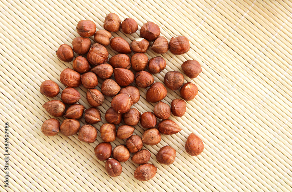 hazelnuts on a wooden background hazelnuts on a wooden background