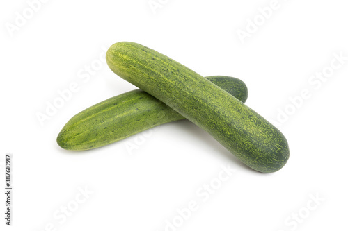 Two cucumbers isolated on a white background.
