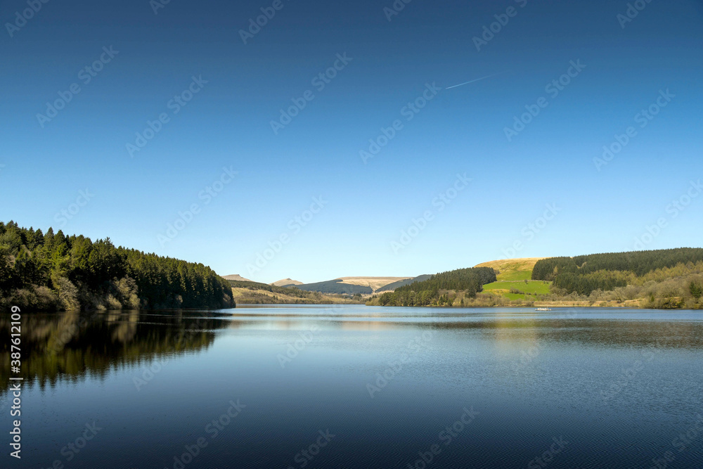 Scenic view of Ponsticill reservoir in South Wales bright sunshine
