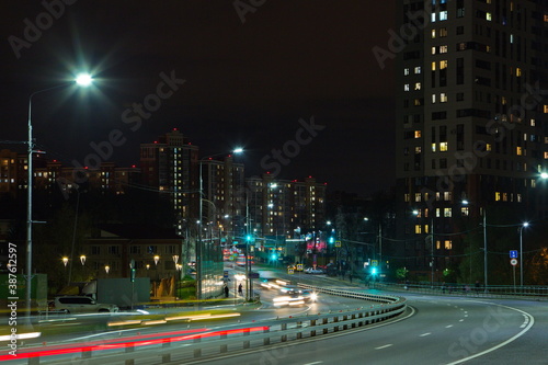 The streets of the night city in the lights of passing cars. © Олег Раков