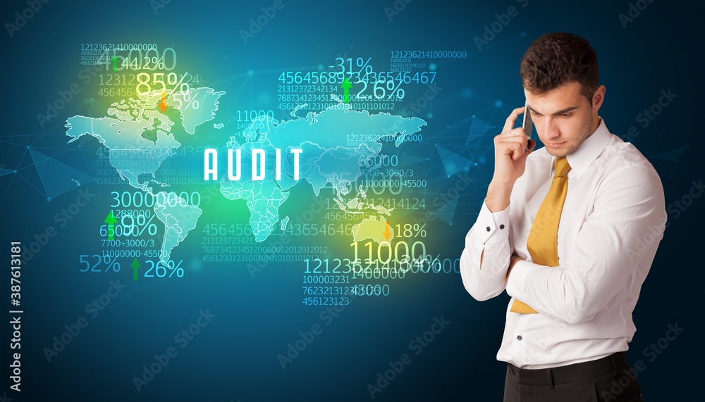 Businessman in front of a decision with AUDIT inscription, business concept Businessman in front of a decision with AUDIT inscription, business concept