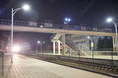 Brest, Belarus - October 22, 2020 - Train arrives at the train station at night