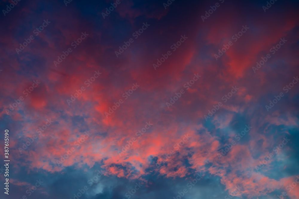 Blue sky with beautiful pink clouds