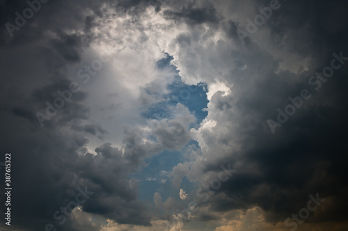 Fototapeta Naklejka Na Ścianę i Meble -  Gray clouds in the blue sky