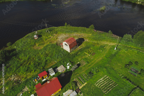 Aerial Townscape of Suburban Village Kolvica located in Northwestern Russia on the Kola Peninsula Kandalaksha Area