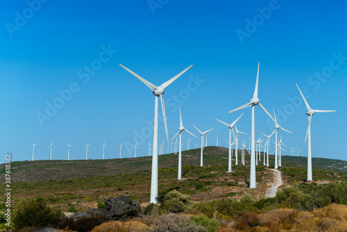 Wallpaper Mural Aerial view large group of eco system wind turbines power generation station on green field in rural landscape in countryside Torontodigital.ca