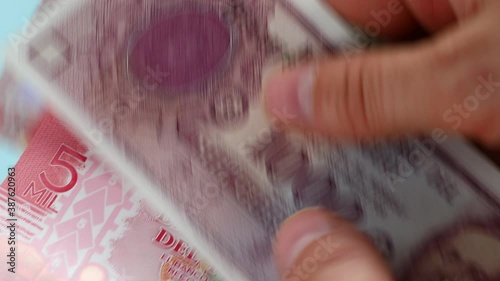Paraguayan money, Guaranies, Counting paper banknotes photo